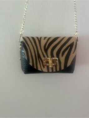 Zebra Print Chain Vera Bella Crossbody Bag in Black and Cream